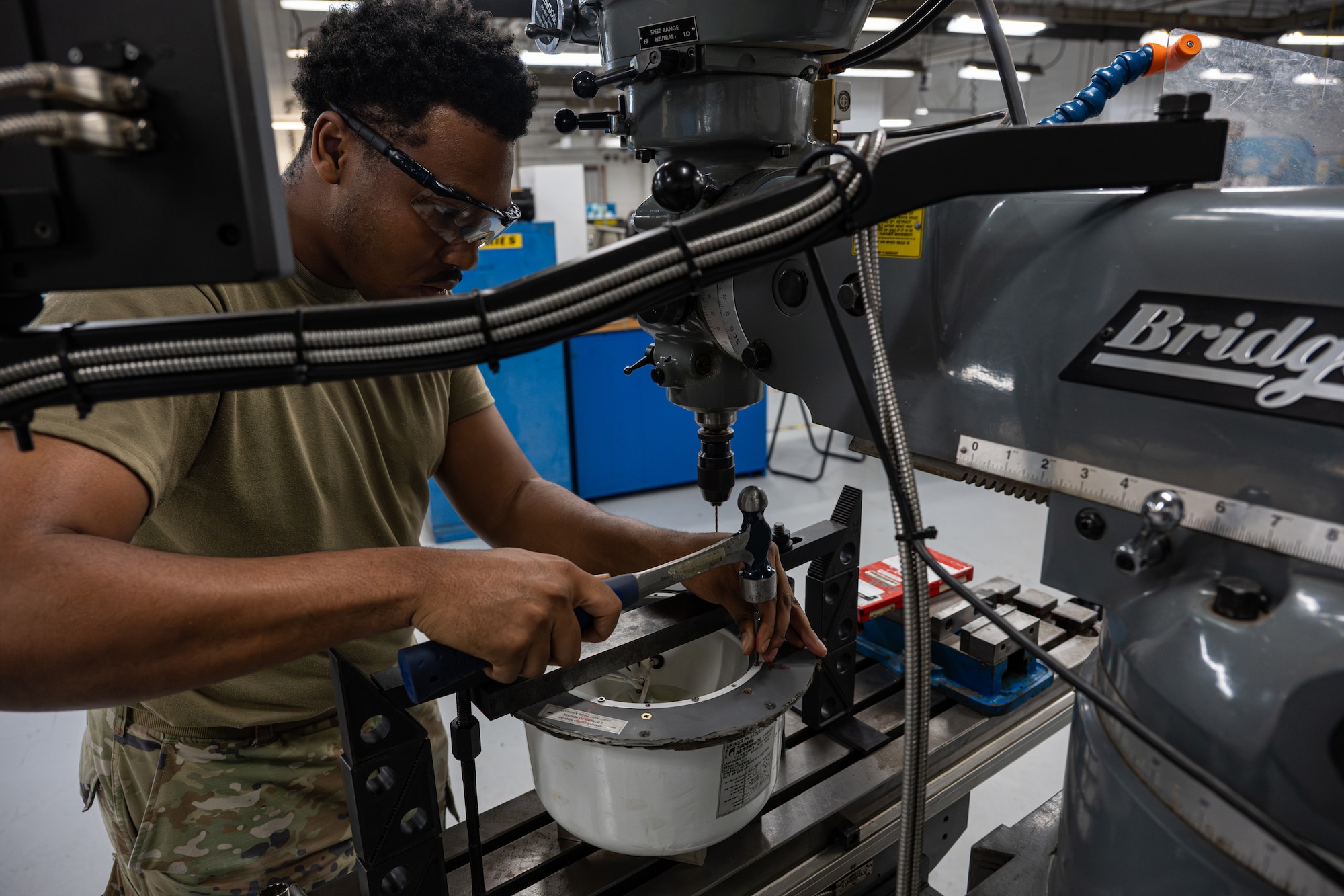 U.S. Air Force Senior Airman Perez Barbour, 436th Maintenance Squadron metals technology apprentice, removes screws from an aircraft part so he can fix it for use on Dover Air Force Base, Delaware, June 4, 2026.