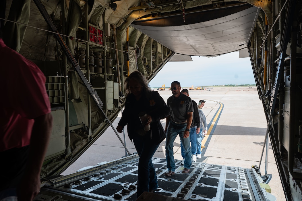 Goodfellow Air Force Base's honorary commanders receive a tour on a C-130J Super Hercules assigned to the 317th Airlift Wing, Dyess Air Force Base, Texas, May 29, 2026.