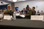 Name placards for U.S. Marine Corps Col. Gregory Pace, commanding officer, Marine Corps Installations East–Marine Corps Base Camp Lejeune, and Col. Thomas C. Farrington II, commanding officer, Marine Corps Air Station New River, at the 2026 State of the Community Luncheon at the Onslow County Government Center, in Jacksonville, North Carolina, June 4, 2026. This event highlighted the importance of collaboration between military, local government, businesses and community organizations. (U.S. Marine Corps Photo by Cpl. Jessica J. Mazzamuto)