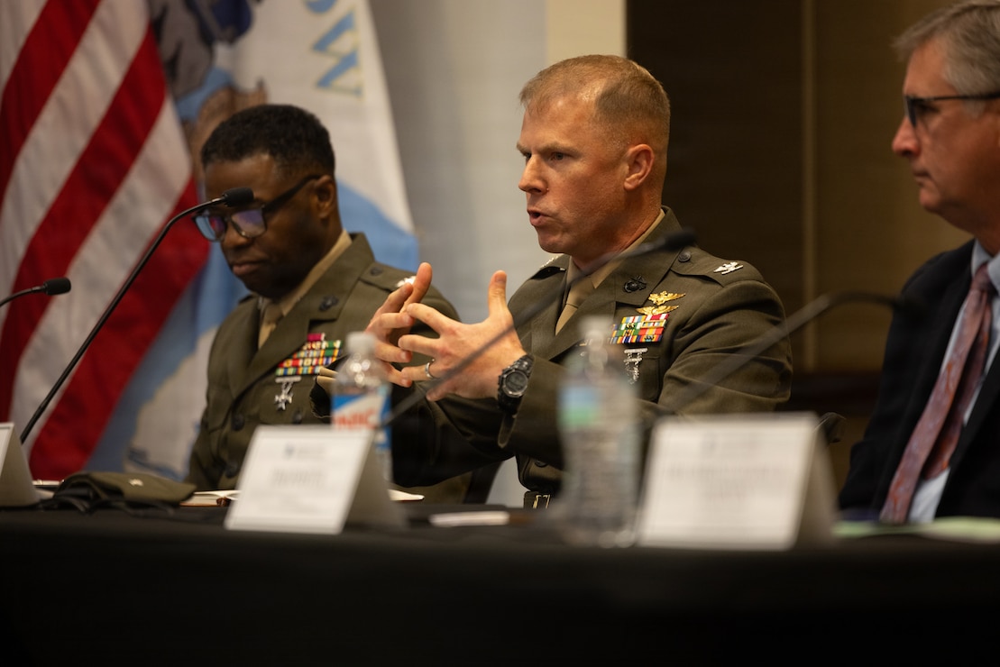 U.S. Marine Corps Col. Thomas C. Farrington II, center, commanding officer, Marine Corps Air Station New River, speaks about the MCAS New River’s recent energy exercise during the 2026 State of the Community Luncheon at the Onslow County Government Center, in Jacksonville, North Carolina, June 4, 2026. This event highlighted the importance of collaboration between military, local government, businesses and community organizations. (U.S. Marine Corps Photo by Cpl. Jessica J. Mazzamuto)
