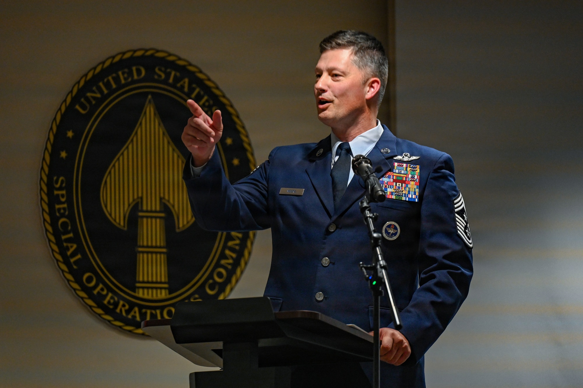 Chief Master Sgt. Joshua Moore, 1st Special Operations Wing incoming command chief, delivers remarks during a change of responsibility ceremony at Hurlburt Field, Florida, June 5, 2026.