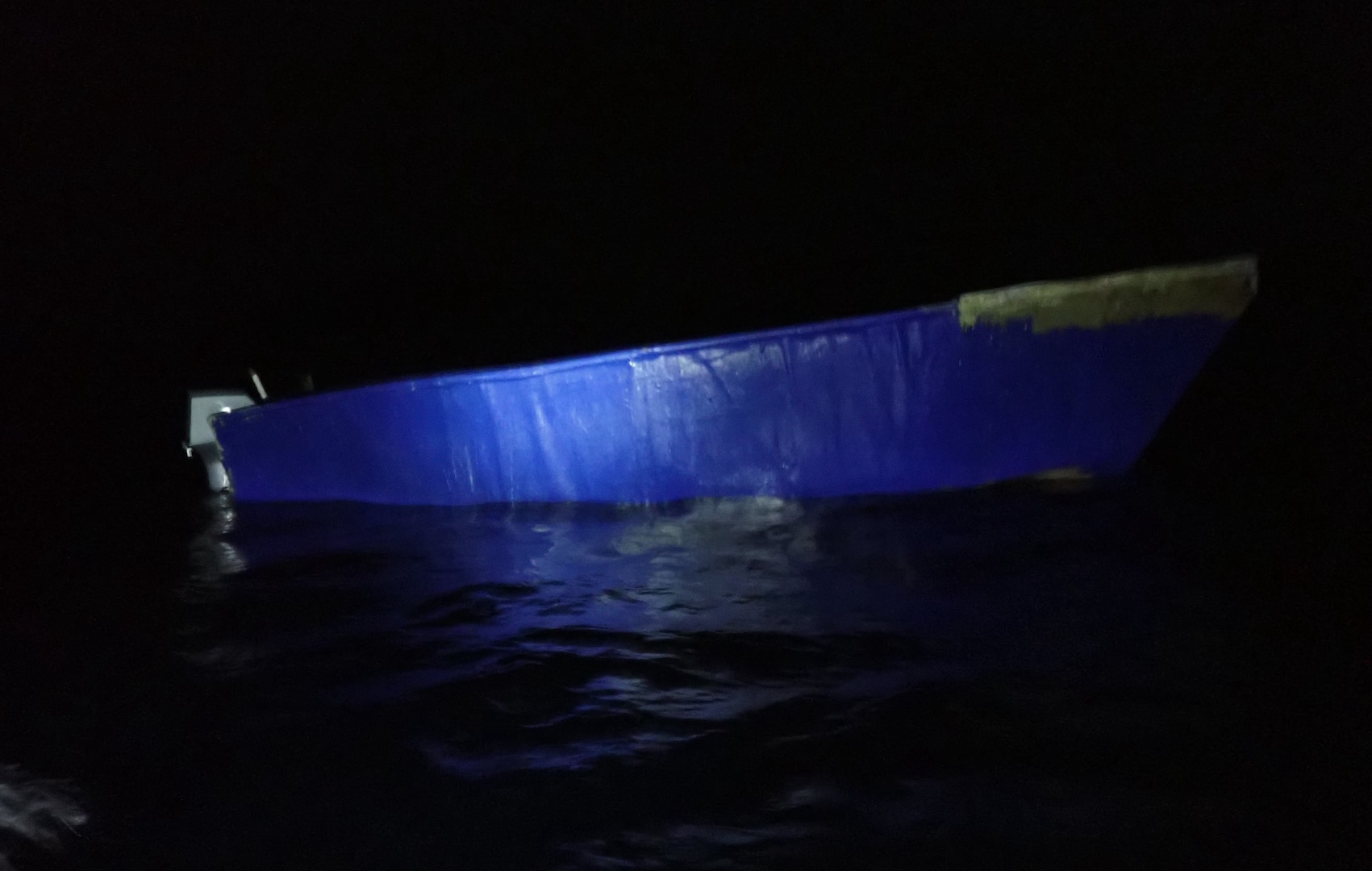 An empty makeshift vessel following Coast Guard Cutter Heriberto Hernandez's interdiction of 40 aliens during an unlawful maritime migration voyage off Desecheo, Puerto Rico, June 6, 2026.  Cutter Heriberto Hernandez's crew repatriated at sea 32 aliens from this voyage to a Dominican Republic Navy vessel June 7, 2026. (U.S. Coast Guard photo).