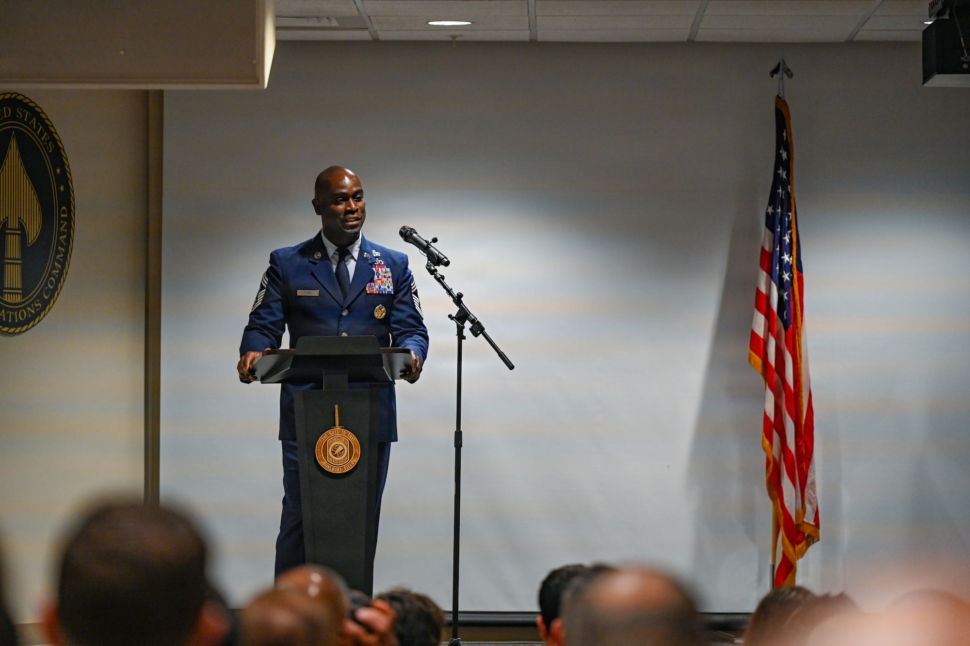 Chief Master Sgt. Ralph Oliver, 1st Special Operations Wing outgoing command chief, delivers remarks during a change of responsibility ceremony at Hurlburt Field, Florida, June 5, 2026.