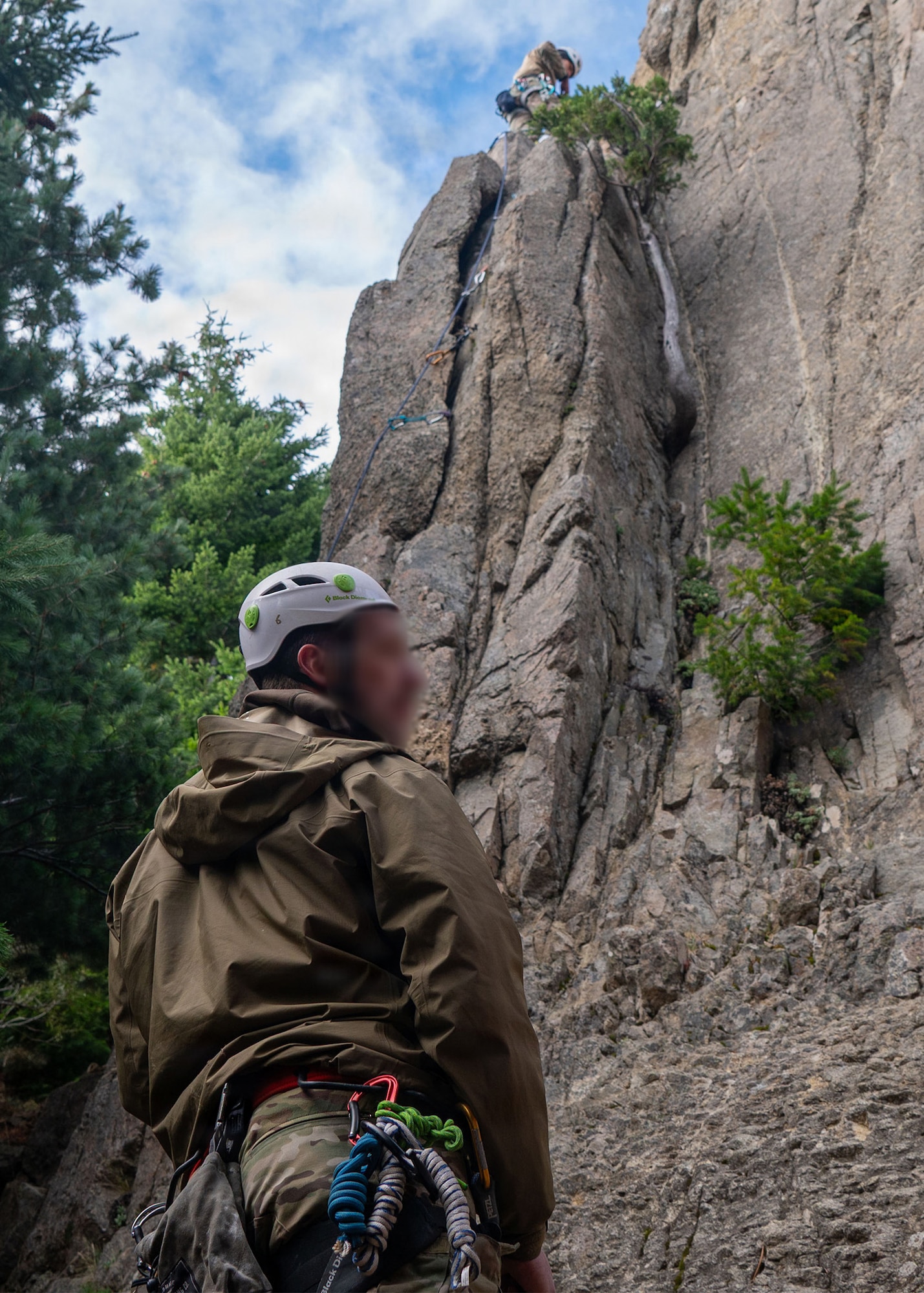 A U.S. Airman U.S. Airmen from the 919th Special Operations Wing belays an Argentinean soldier on a rock face at the Escuela Militar de Montaña in Bariloche, Argentina.