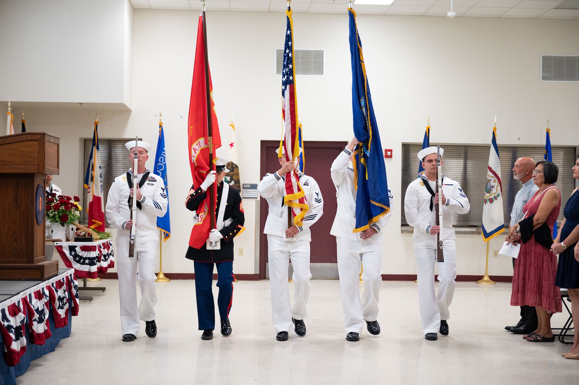 The Navy Reserve Center Honor Guard parades the colors during a change of command ceremony at Kirtland Air Force Base, N. M., June 7, 2026. During the ceremony, Lieutenant Commander Lazaro Cardenas relieved Commander Nicholas Bularzik of his duties commanding the NRC Albuquerque. (U.S. Air Force photo by Tech. Sgt. Gabrielle Winn)