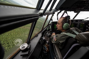 U.S. Air Force Lt. Col. Tristan Stonger, a pilot assigned to the 123rd Airlift Wing, Kentucky Air National Guard, flies a C-130J Super Hercules aircraft in the airspace above Karup, Denmark, June 4, 2026. The 123rd AW is providing tactical airlift support to NATO Allies throughout the month of June as part of Ramstein Flag 2026, an Allied Air Command large-scale, air-focused, multi-location and joint operating area exercise that kicks off June 8 with 18 participating nations and more than 200 aircraft. (U.S. Air National Guard photo by Master Sgt. Joshua Horton)