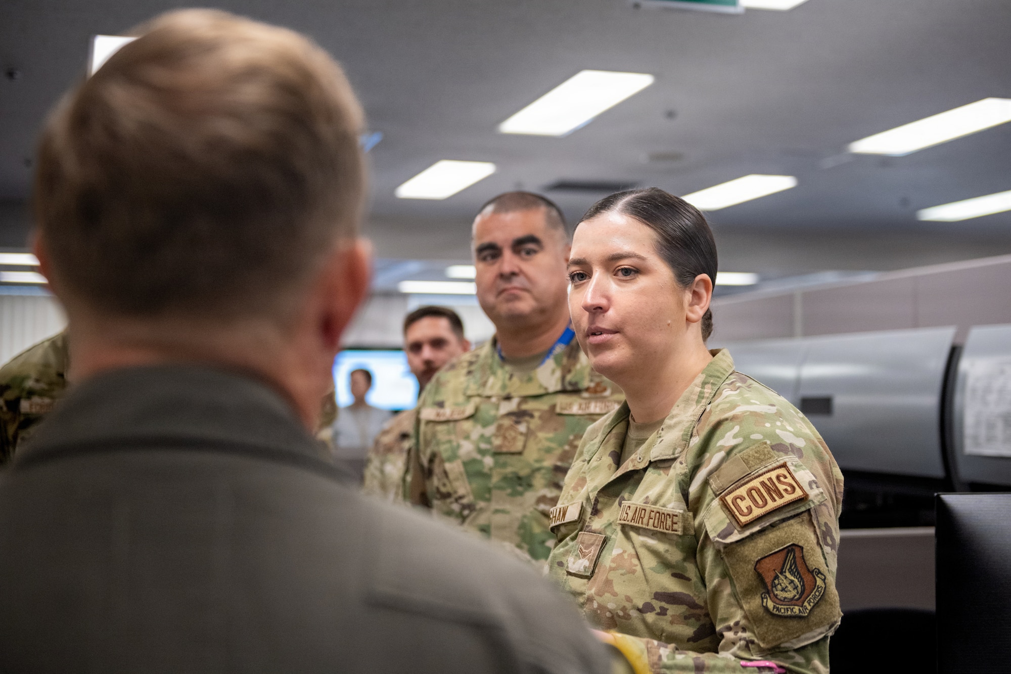 U.S. Air Force Airman 1st Class Katie Kershaw, 35th Contracting Squadron contract specialist, explains her role in the process of awarding contracts for programs and services to 35th Fighter Wing leaders during a Wild Weasel Walk-Through.