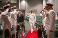 260604-N-MZ309-1023 KEYPORT, Wash. (June 4, 2026) Capt. Lacy Lodmell arrives to a change of command ceremony at the U.S. Naval Undersea Museum in Keyport, Washington, June 4, 2026. During the ceremony Lodmell relieved Capt. Rob Garis as commodore of Submarine Squadron (CSS) 19. CSS-19 is subordinate to Commander, Submarine Group (SUBGRU) 9 which exercises administrative and operational control of assigned submarine commands and units in the Pacific Northwest, providing oversight for shipboard training, personnel, and the supply and material readiness of SSBNs and their crews. SUBGRU-9 is also responsible for nuclear submarines undergoing conversion or overhaul at Puget Sound Naval Shipyard in Bremerton. (U.S. Navy photo by Mass Communication Specialist 1st Class Ryan Riley)