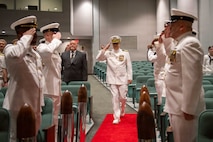 260604-N-MZ309-1023 KEYPORT, Wash. (June 4, 2026) Capt. Lacy Lodmell arrives to a change of command ceremony at the U.S. Naval Undersea Museum in Keyport, Washington, June 4, 2026. During the ceremony Lodmell relieved Capt. Rob Garis as commodore of Submarine Squadron (CSS) 19. CSS-19 is subordinate to Commander, Submarine Group (SUBGRU) 9 which exercises administrative and operational control of assigned submarine commands and units in the Pacific Northwest, providing oversight for shipboard training, personnel, and the supply and material readiness of SSBNs and their crews. SUBGRU-9 is also responsible for nuclear submarines undergoing conversion or overhaul at Puget Sound Naval Shipyard in Bremerton. (U.S. Navy photo by Mass Communication Specialist 1st Class Ryan Riley)