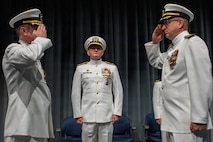 260604-N-MZ309-1177 KEYPORT, Wash. (June 4, 2026) Capt. Lacy Lodmell relieves Capt. Rob Garis as commodore of Submarine Squadron (CSS) 19 during a change of command ceremony at the U.S. Naval Undersea Museum in Keyport, Washington, June 4, 2026. CSS-19 is subordinate to Commander, Submarine Group (SUBGRU) 9 which exercises administrative and operational control of assigned submarine commands and units in the Pacific Northwest, providing oversight for shipboard training, personnel, and the supply and material readiness of SSBNs and their crews. SUBGRU-9 is also responsible for nuclear submarines undergoing conversion or overhaul at Puget Sound Naval Shipyard in Bremerton. (U.S. Navy photo by Mass Communication Specialist 1st Class Ryan Riley)