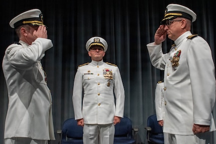 260604-N-MZ309-1177 KEYPORT, Wash. (June 4, 2026) Capt. Lacy Lodmell relieves Capt. Rob Garis as commodore of Submarine Squadron (CSS) 19 during a change of command ceremony at the U.S. Naval Undersea Museum in Keyport, Washington, June 4, 2026. CSS-19 is subordinate to Commander, Submarine Group (SUBGRU) 9 which exercises administrative and operational control of assigned submarine commands and units in the Pacific Northwest, providing oversight for shipboard training, personnel, and the supply and material readiness of SSBNs and their crews. SUBGRU-9 is also responsible for nuclear submarines undergoing conversion or overhaul at Puget Sound Naval Shipyard in Bremerton. (U.S. Navy photo by Mass Communication Specialist 1st Class Ryan Riley)