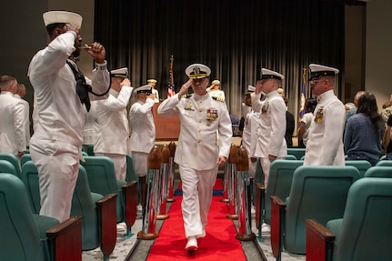 260604-N-MZ309-1225 KEYPORT, Wash. (June 4, 2026) Capt. Rob Garis departs a change of command ceremony at the U.S. Naval Undersea Museum in Keyport, Washington, June 4, 2026. During the ceremony Capt. Lacy Lodmell relieved Garis as commodore of Submarine Squadron (CSS) 19. CSS-19 is subordinate to Commander, Submarine Group (SUBGRU) 9 which exercises administrative and operational control of assigned submarine commands and units in the Pacific Northwest, providing oversight for shipboard training, personnel, and the supply and material readiness of SSBNs and their crews. SUBGRU-9 is also responsible for nuclear submarines undergoing conversion or overhaul at Puget Sound Naval Shipyard in Bremerton. (U.S. Navy photo by Mass Communication Specialist 1st Class Ryan Riley)