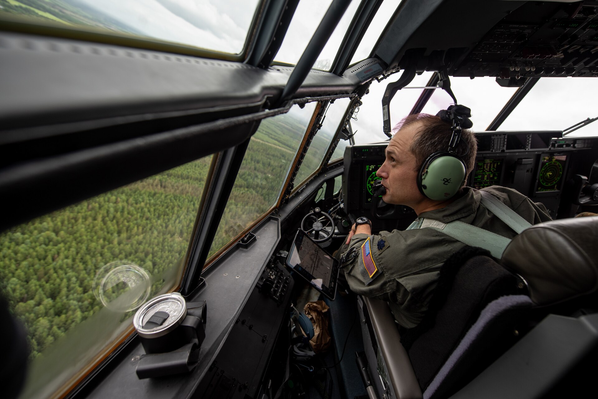 U.S. Air Force Lt. Col. Tristan Stonger, a pilot assigned to the 123rd Airlift Wing, Kentucky Air National Guard, flies a C-130J Super Hercules aircraft in the airspace above Karup, Denmark, June 4, 2026. The 123rd AW is providing tactical airlift support to NATO Allies throughout the month of June as part of Ramstein Flag 2026, an Allied Air Command large-scale, air-focused, multi-location and joint operating area exercise that kicks off June 8 with 18 participating nations and more than 200 aircraft. (U.S. Air National Guard photo by Master Sgt. Joshua Horton)