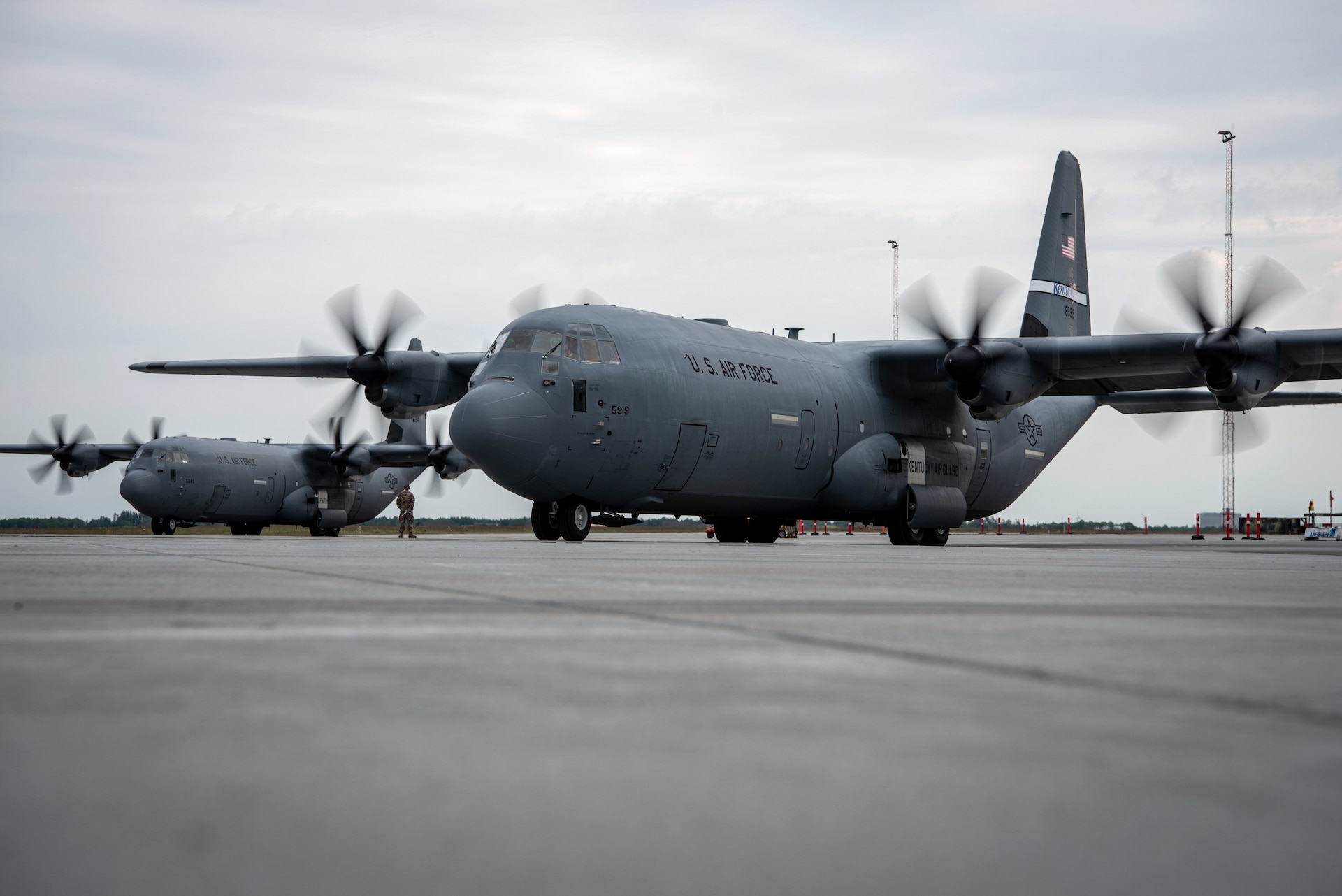 Two U.S. Air Force C-130J Super Hercules aircraft assigned to the 123rd Airlift Wing, Kentucky Air National Guard, prepare to depart Karup Air Base, Denmark, June 2, 2026. The 123rd AW is providing tactical airlift support to NATO Allies throughout the month of June in support of Ramstein Flag 2026, an Allied Air Command large-scale, air-focused, multi-location and joint operating area exercise with 18 participating nations and more than 200 aircraft. (U.S. Air National Guard photo by Master Sgt. Joshua Horton)