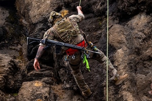 A U.S. Airman U.S. Airmen from the 492nd Special Operations Wing rappels down a cliff face during training at the Escuela Militar de Montaña in Bariloche, Argentina.