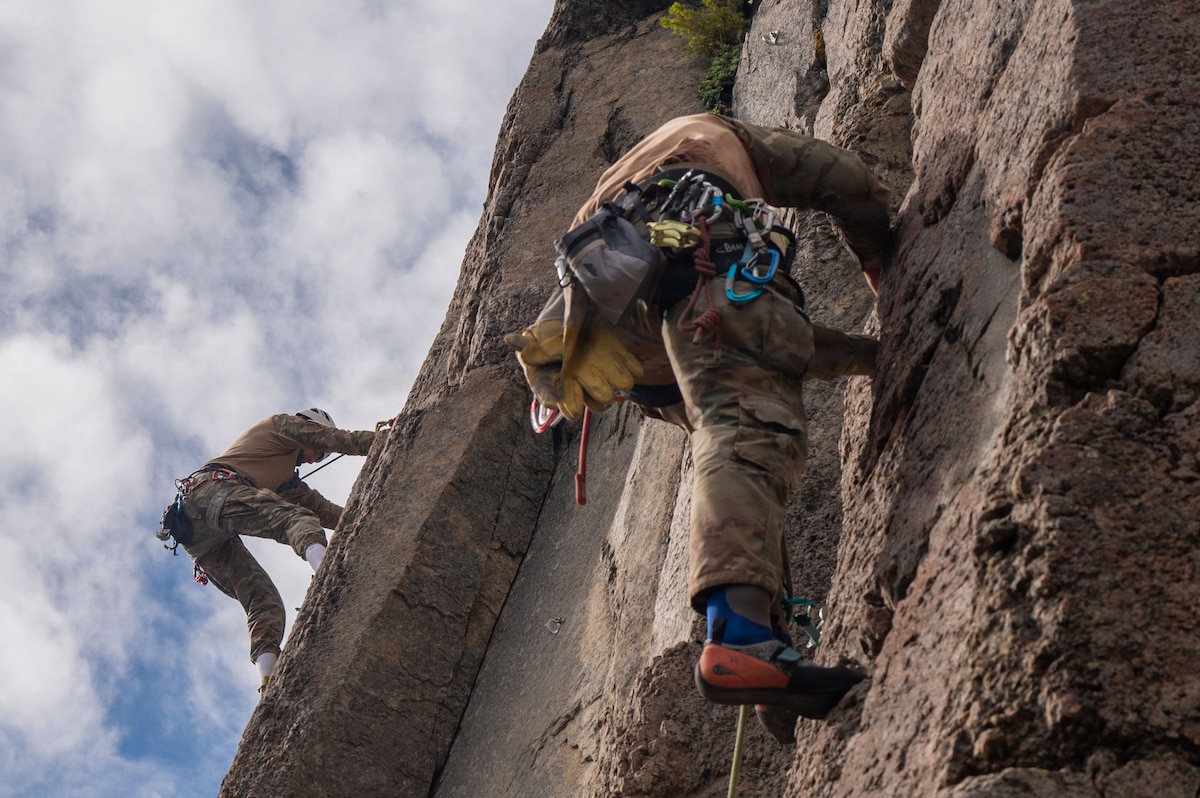 Argentinean soldiers climb a rock face at the Escuela Militar de Montaña in Bariloche, Argentina.