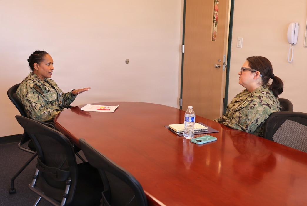 Capt. Janiese Cleckley (left), commanding officer of Navy Medicine Readiness and Training Command Twentynine Palms, speaks with Lt. Catherine "Nicole" Thomas, department head of Navy Medicine Readiness and Training Detachment Bridgeport, during NMRTC Twentynine Palms' "CO for a Day" program May 21, 2026. The program provides officers an opportunity to gain insight into executive leadership, command operations and strategic decision-making within Navy Medicine. (U.S. Navy photo by Christopher Jones, NMRTC/NH Twentynine Palms public affairs officer)