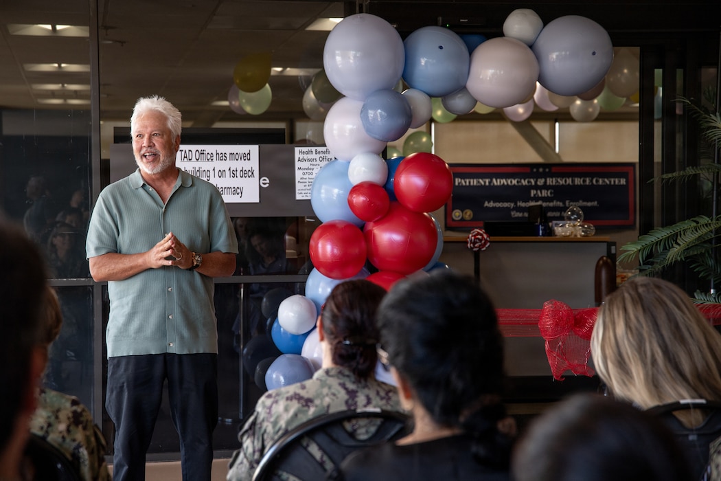 Jeff Apana, former Naval Medical Center San Diego Patient Relations department head, speaks to an audience of leadership, staff, and other stakeholders during the grand opening ceremony of the Patient Advocacy and Resource Center, at NMCSD, June 9. The PARC aims to remove barriers to care by creating a single point of contact for beneficiaries to resolve administrative or care concerns. NMCSD employs more than 5,500 active-duty military personnel, civilians, and contractors in Southern California to deliver exceptional care afloat and ashore. (U.S. Navy photo by Mass Communication Specialist 3rd Class Jason Afable)