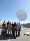 The U.S. Naval Research Laboratory (NRL) receives a satellite tracking antenna system from the U.S. Space Force (USSF) at the Blossom Point Tracking Facility in Welcome, Md. March 5, 2026. NRL and USSF partnered to support expanded joint testing and operational readiness for space systems, reinforcing collaboration between the naval and space communities. (U.S. Navy photo by Sarah Peterson)