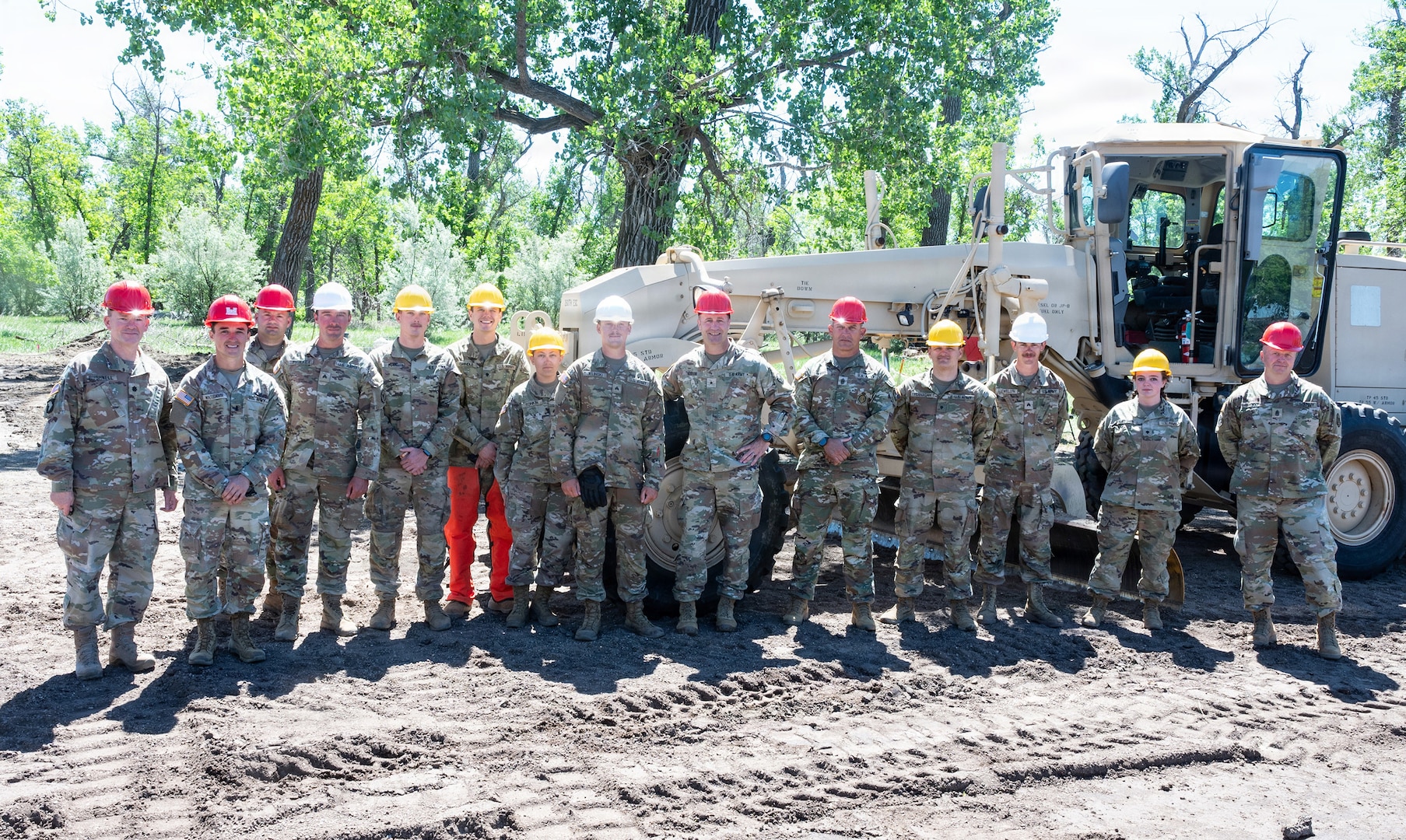 Soldiers assigned to Detachment 1, 230th Engineer Company pose for a group photo during a community construction project at Legion Park in Culbertson, Montana, June 2026.