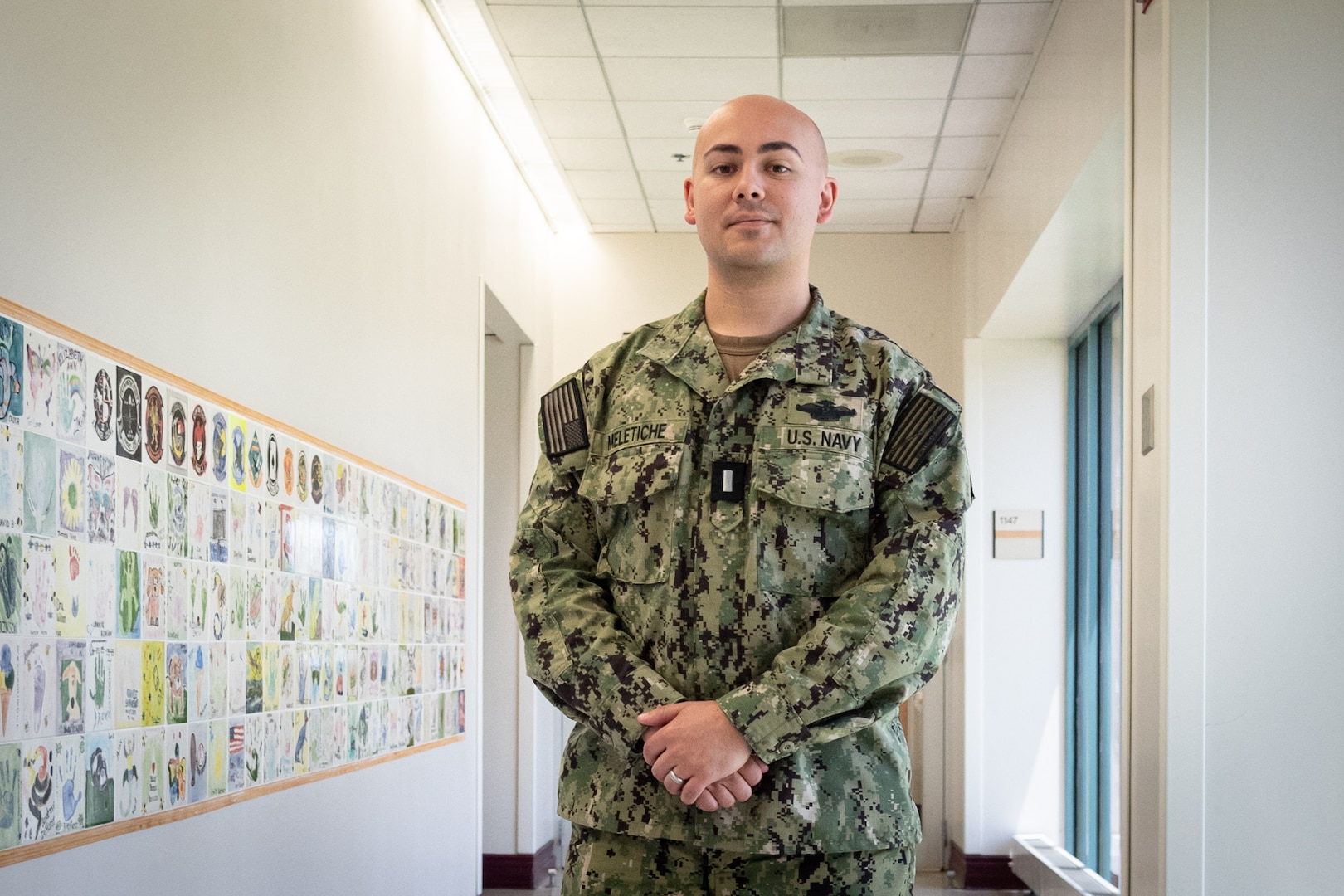 Navy Lt. j.g. Nelyavier Meletiche serves as a physician assistant aboard Navy Medicine Readiness and Training Command Cherry Point.  A graduate of the Medical Service Corps Interservice Procurement Program and Madison, Wisconsin, native, he credits his time as an enlisted hospital corpsman and surgical technologist with being able to better care for his patients.