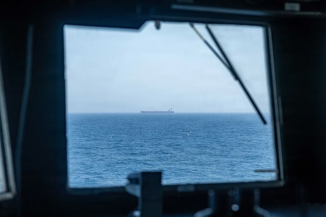 Arleigh Burke-class guided-missile destroyer USS Rafael Peralta (DDG 115) patrols the Arabian Sea enforcing a maritime blockade against ships entering or exiting Iranian ports and coastal areas