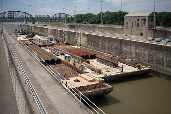 The M/V Elizabeth Ann locks through McAlpine Locks and Dam with a heavy crane bound from St. Louis to Cincinnati, May 30, 2026 in Louisville, Kentucky. The Ohio Department of Transportation worked with USACE to provide imagery of the trip for an ODOT "barge watch" public engagement campaign.