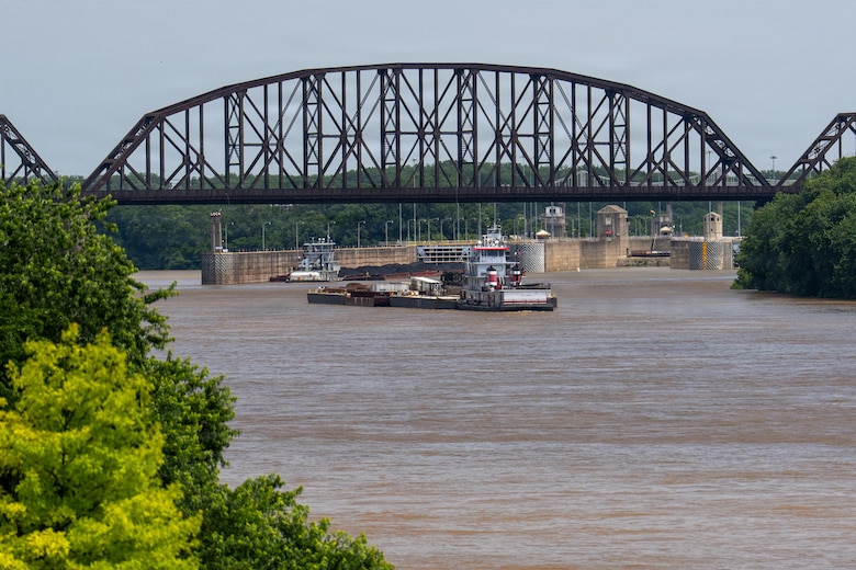 The M/V Elizabeth Ann locks waits to lock through McAlpine Locks and Dam with a heavy crane bound from St. Louis to Cincinnati, May 30, 2026 in Louisville, Kentucky. The Ohio Department of Transportation worked with USACE to provide imagery of the trip for an ODOT "barge watch" public engagement campaign.
