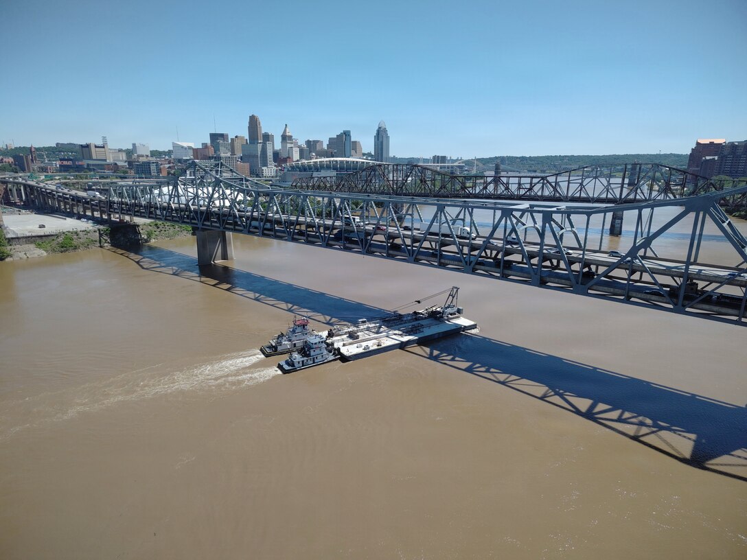 A heavy crane is transported by the M/V Elizabeth Ann, which traveled from St. Louis to Cincinnati, June 2, 2026 in Cincinnati, Ohio. The Ohio Department of Transportation worked with USACE to provide imagery of the trip for an ODOT "barge watch" public engagement campaign.