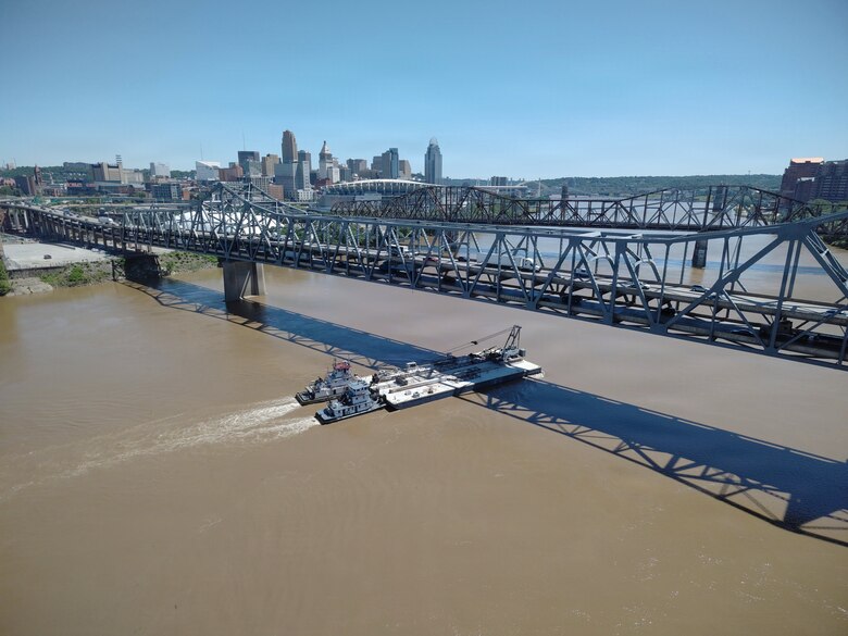 A heavy crane is transported by the M/V Elizabeth Ann, which traveled from St. Louis to Cincinnati, June 2, 2026 in Cincinnati, Ohio. The Ohio Department of Transportation worked with USACE to provide imagery of the trip for an ODOT "barge watch" public engagement campaign.