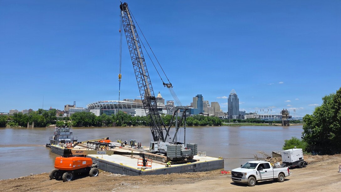 A heavy crane is set up after being transported by the M/V Elizabeth Ann, which traveled from St. Louis to Cincinnati, June 2, 2026 in Cincinnati, Ohio. The Ohio Department of Transportation worked with USACE to provide imagery of the trip for an ODOT "barge watch" public engagement campaign.