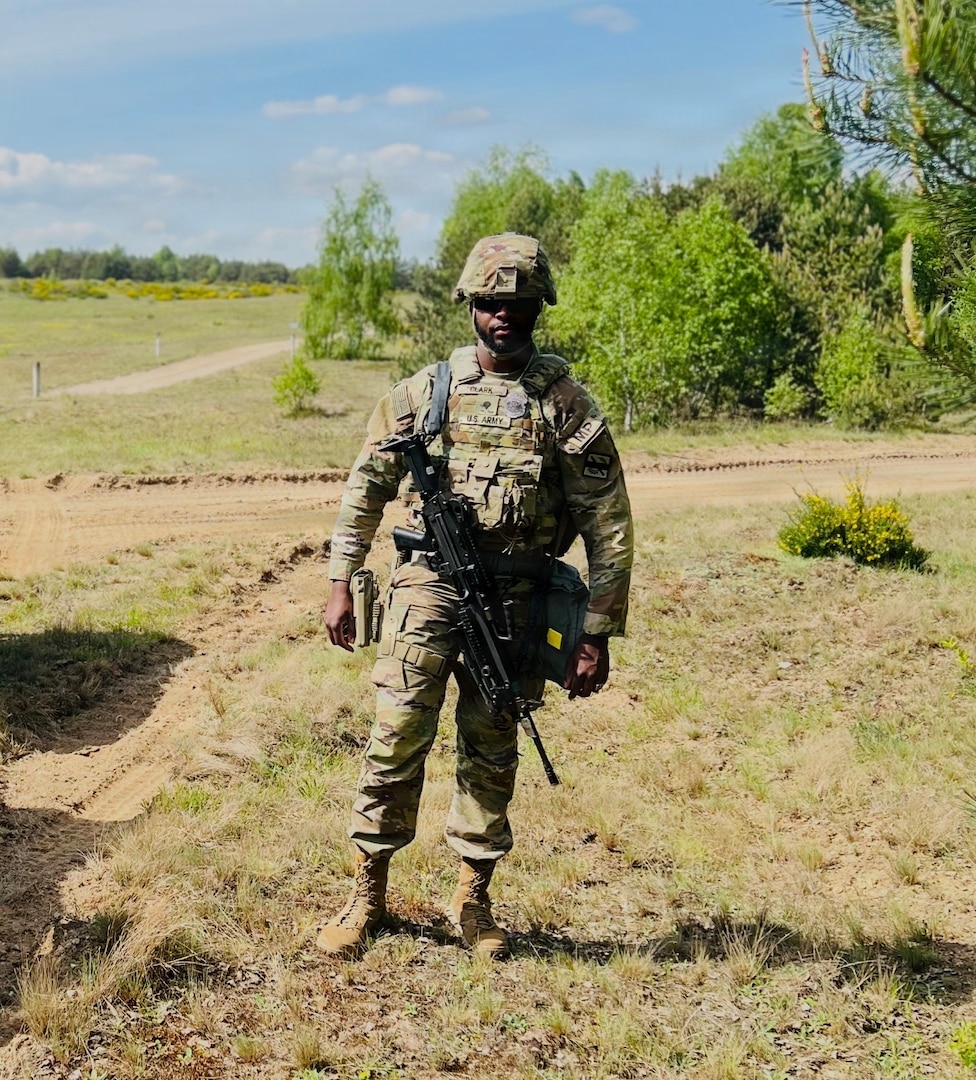 U.S. Army National Guard Spc. Rayshaun Clark, a military police officer with the Georgia National Guard, currently assigned to Joint Task Force- District of Columbia in support of the DC Safe and Beautiful mission, applied his training as both a military and civilian police officer to successful de-escalate a potentially violent confrontation at the Navy Yard in Washington, May 22, 2026. About 2,500 National Guard members support the D.C. Safe and Beautiful mission, assisting the Metropolitan Police Department in maintaining public safety for residents, commuters and visitors throughout the District.