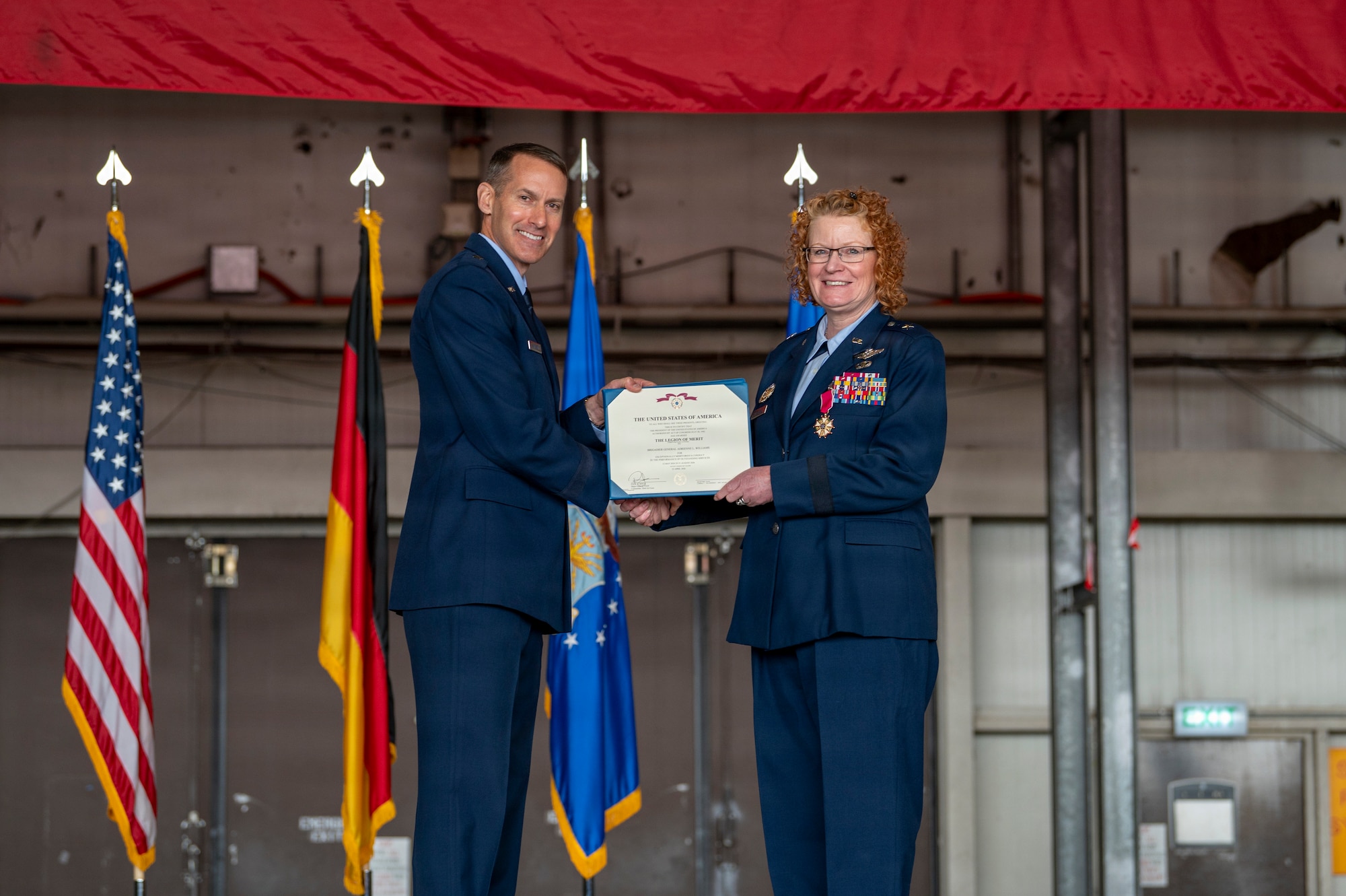 A photo of a commander receiving an award