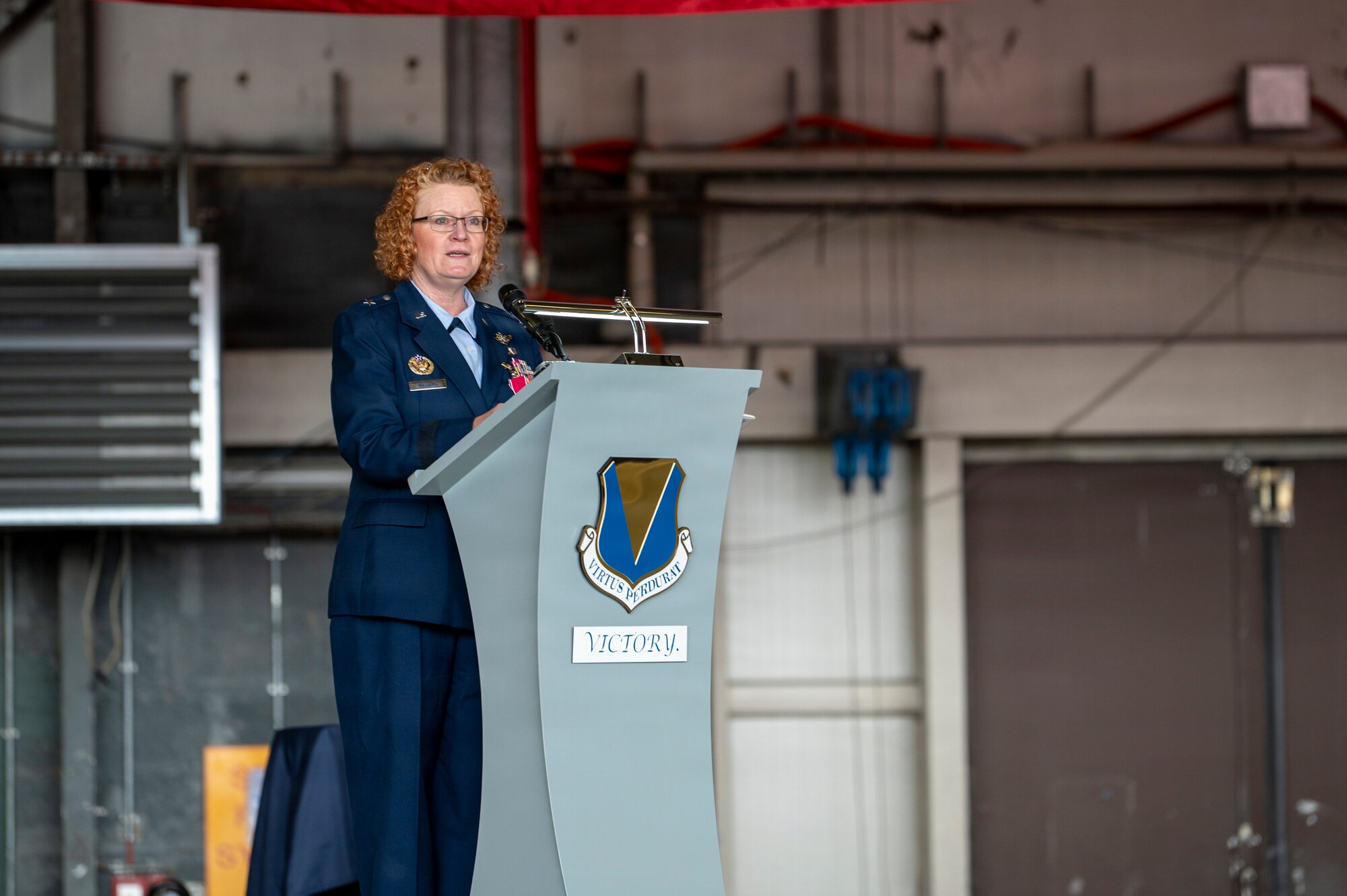 A photo of a commander at a podium
