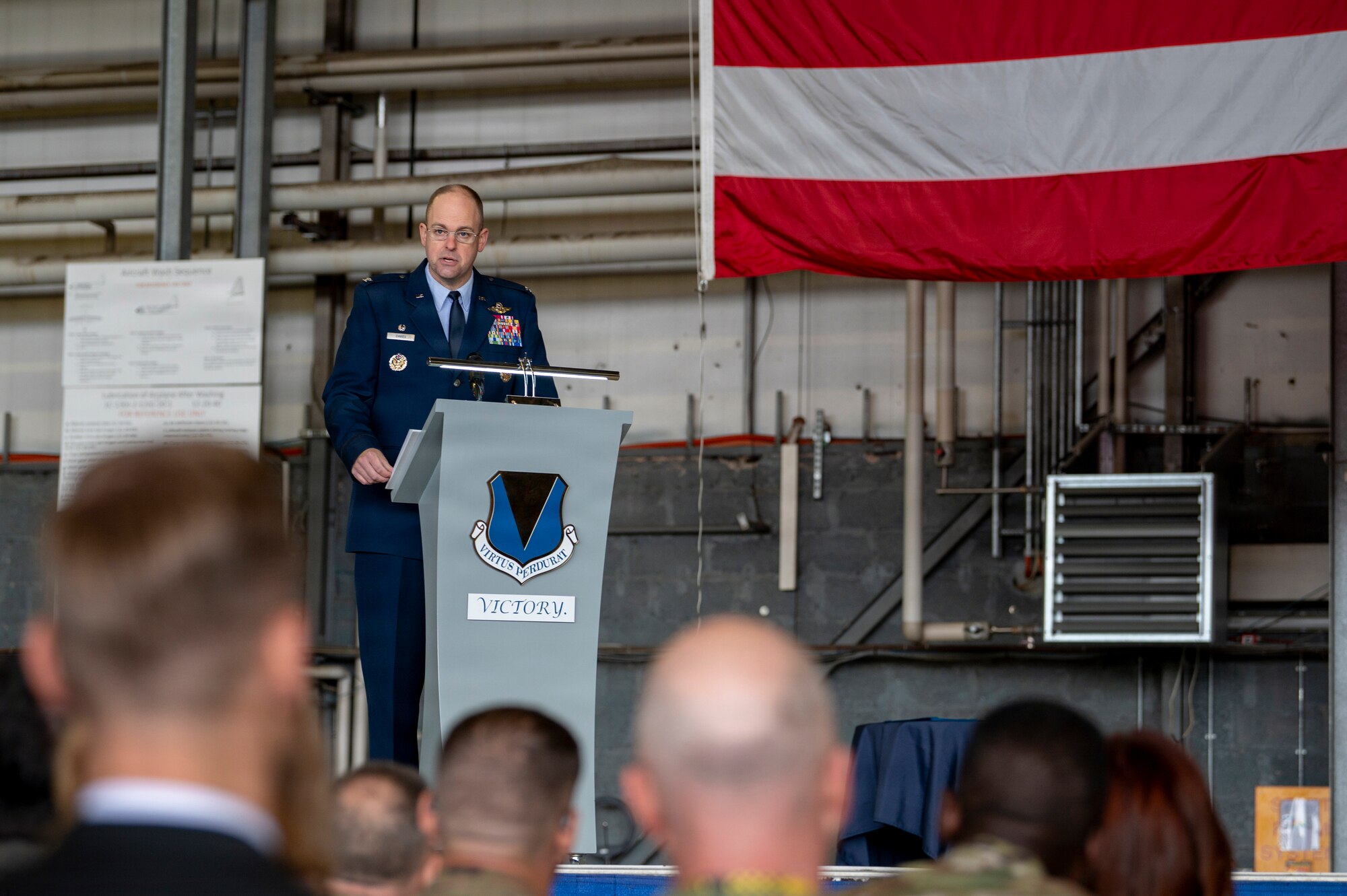 A photo of a commander at a podium