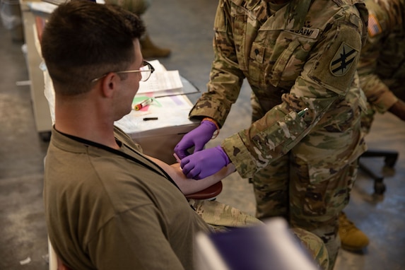 U.S. Army Soldiers assigned to Marietta-based 78th Troop Command, Georgia Army National Guard, receive a briefing on Georgia Army National Guard benefits during a Soldier Readiness Processing event at Fort Stewart, Georgia, June 6, 2026. SRP is a comprehensive assessment that verifies medical, dental, administrative and personnel readiness, ensuring Soldiers are prepared to deploy, respond and support mission requirements when called upon. (U.S. Army National Guard photo by Sgt. Jacob Tucker)