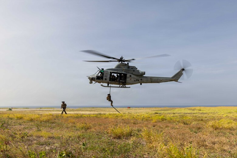U.S. Marines with Lima Company, 3rd Battalion, 2nd Marine Regiment, and Maritime Raid Force, both with Littoral Combat Force-24, conduct a long range fast-rope rehearsal from a UH-1Y Venom with Marine Medium Tiltrotor Squadron (VMM) 365 (Reinforced), LCF-24, at Naval Station Guantanamo Bay, Cuba, June 4, 2026. U.S. military forces are deployed to the U.S. Southern Command area of responsibility in support of Operation SOUTHERN SPEAR, Department of War-directed operations, and the president’s priorities to disrupt illicit drug trafficking, deter malign actors and protect the homeland through continuous presence. (U.S. Marine Corps photo)