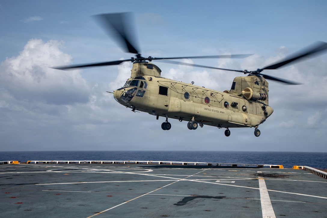 A U.S. Army CH-47 Chinook assigned to Joint Task Force-Bravo, lands aboard San Antonio-class amphibious transport dock USS Fort Lauderdale (LPD 28) during deck landing qualifications while underway in the Caribbean Sea, June 4, 2026. U.S. military forces are deployed to the U.S. Southern Command area of responsibility in support of Operation SOUTHERN SPEAR, Department of War-directed operations, and the president’s priorities to disrupt illicit drug trafficking, deter malign actors and protect the homeland through continuous presence. (U.S. Marine Corps photo)