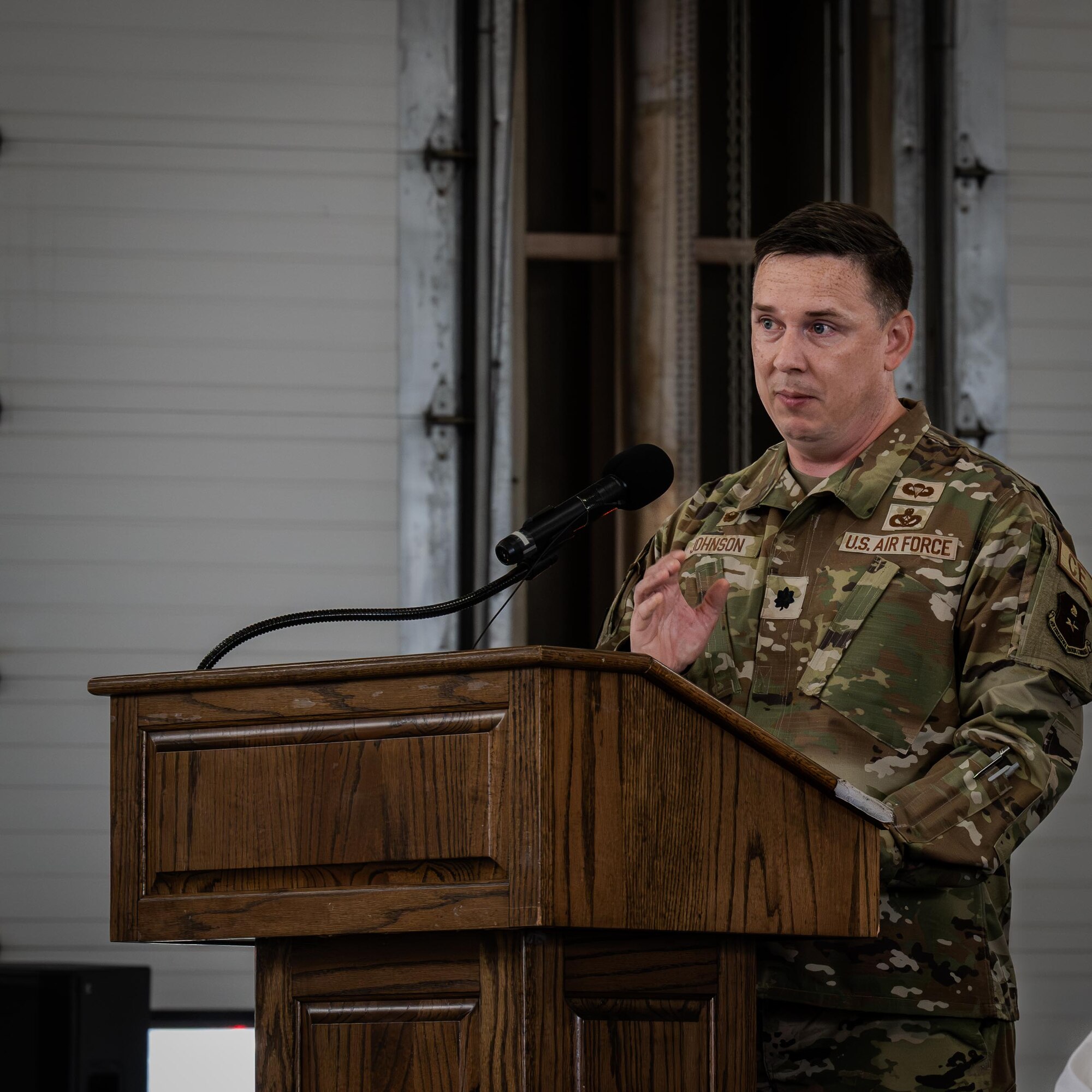 U.S. Air Force Lt. Col. Benjamin Johnson, incoming commander of the 47th Civil Engineer Squadron (CES), gives a speech during the 47th CES change of command ceremony at Laughlin Air Force Base, Texas, June 9, 2026. Change of command ceremonies represent a formal transfer of authority and responsibility for a unit from one commanding officer to another. (U.S. Air Force photo by Airman 1st Class Harrison Sullivan)