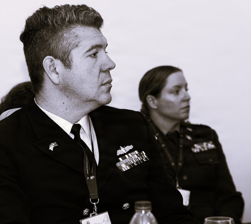 U.S. Navy Cdr. Josh Estevan listens to the discussion during staff talks in May between Illinois National Guard senior leaders and the Portuguese Armed Forces.
