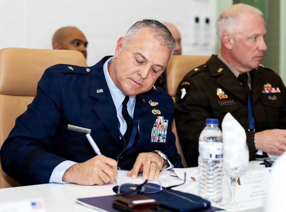 Illinois National Guard Assistant Adjutant General – Air Brig. Gen. Steve Rice signs an agreement during staff talks in May between Illinois National Guard senior leaders and the Portuguese Armed Forces.