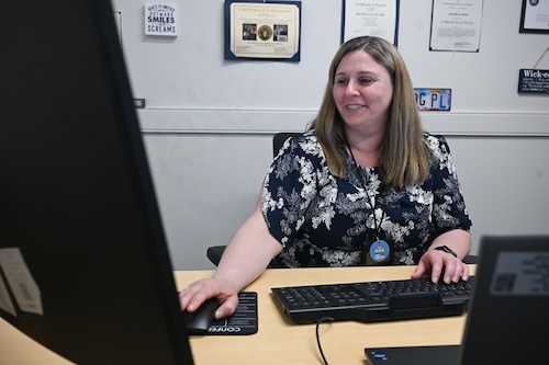 Michelle Huard, Kessel Run Wing Command and Control branch contracting chief, reviews a contract, here, June 4, 2026. The Department of the Air Force Portfolio Acquisition Executive for Command, Control, Communications and Battle Management formally delegated key contracting authorities, in alignment with the Department of War’s pivot to a warfighter-focused acquisition system, as close as possible to the units focused on mission outcomes.