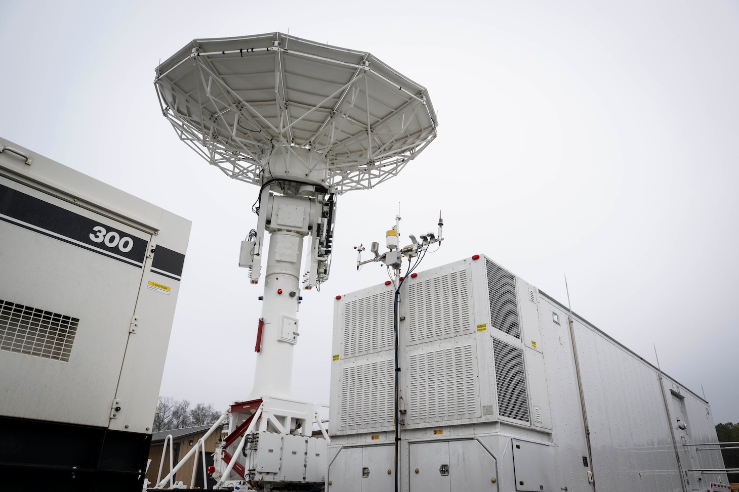 The U.S. Naval Research Laboratory (NRL) receives a satellite tracking antenna system from the U.S. Space Force (USSF) at the Blossom Point Tracking Facility in Welcome, Md. March 5, 2026. NRL and USSF partnered to support expanded joint testing and operational readiness for space systems, reinforcing collaboration between the naval and space communities. (U.S. Navy photo by Sarah Peterson)