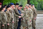 Air Force Gen. Steve Nordhaus, chief, National Guard Bureau, joins Maj. Gen. Kaspars Pudans, chief of defense for the Republic of Latvia, for a ceremonial wreath laying at the Riga Brethren Cemetery to honor Latvians who gave their lives for their country’s independence, Riga, Latvia, June 2, 2026. Nordhaus, accompanied by Senior Enlisted Advisor to the Chief of the National Guard Bureau John Raines and Army Maj. Gen. Paul Rogers, adjutant general of the Michigan National Guard, visited Latvia to underscore the 33-year Michigan-Latvia security cooperation relationship under the Department of War National Guard Bureau State Partnership Program. Photo by Master Sgt. Zach Sheely.