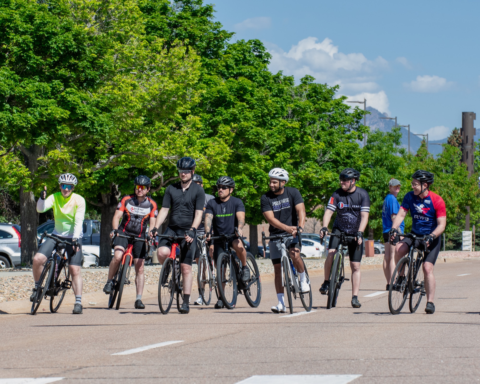 Riders line up next to each other on the road ready to start the 10K.