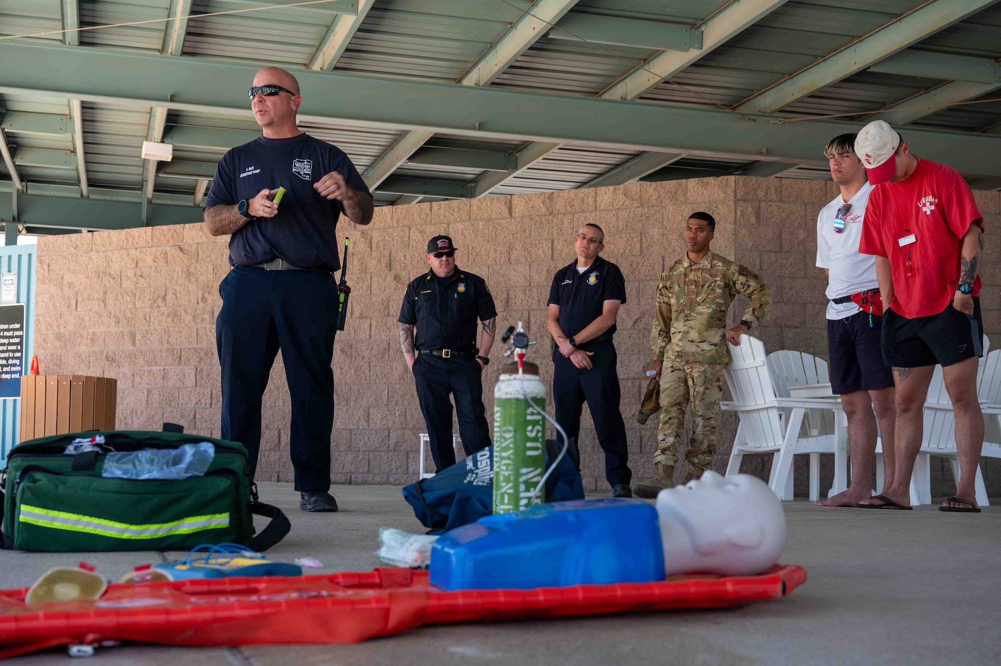 The Davis-Monthan fire team debriefs a training.