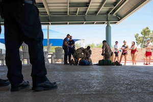 Emergency personnel at Davis-Monthan train in a water emergency scenario.