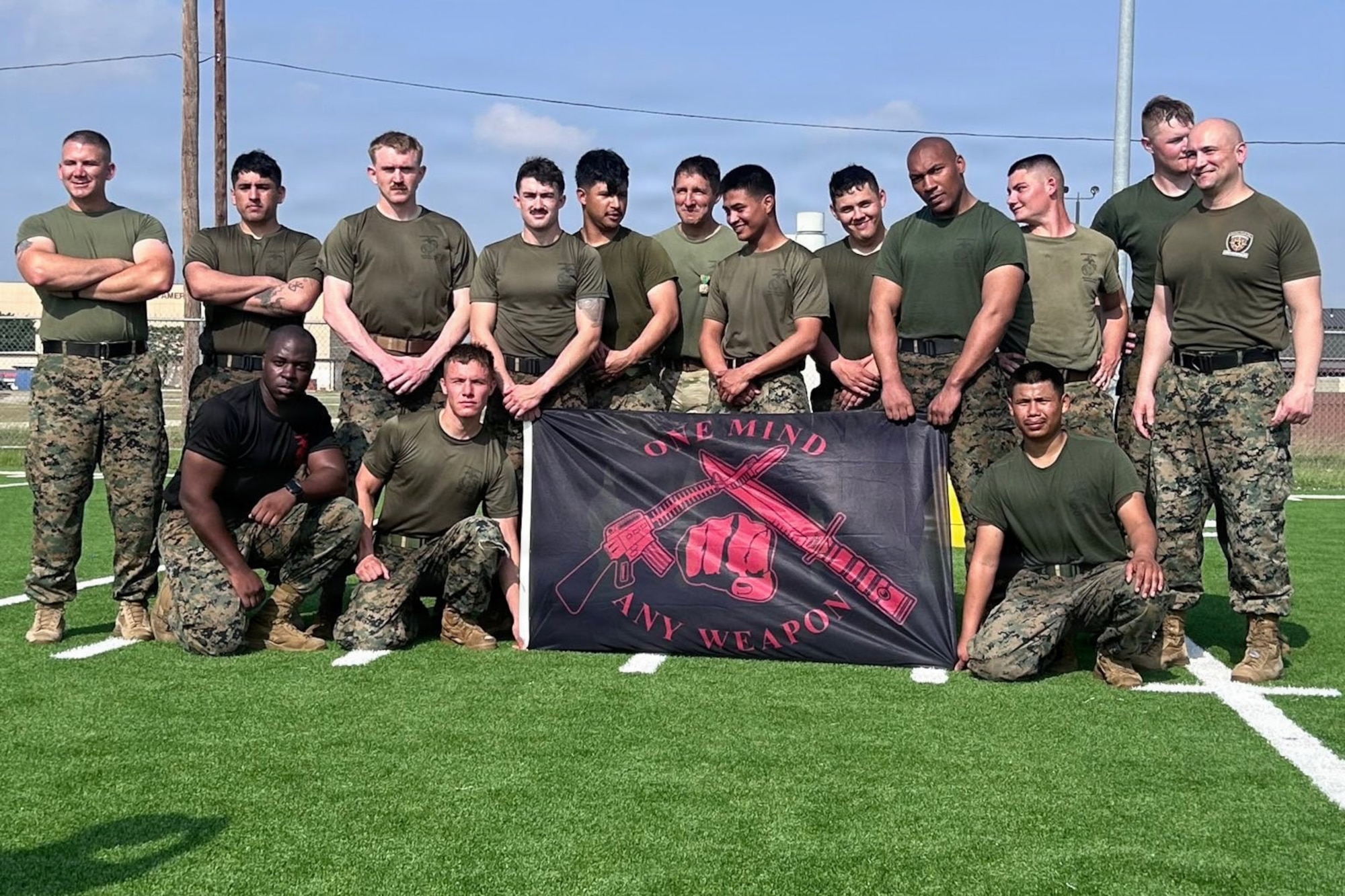 Airmen and Marines pose for a group photo