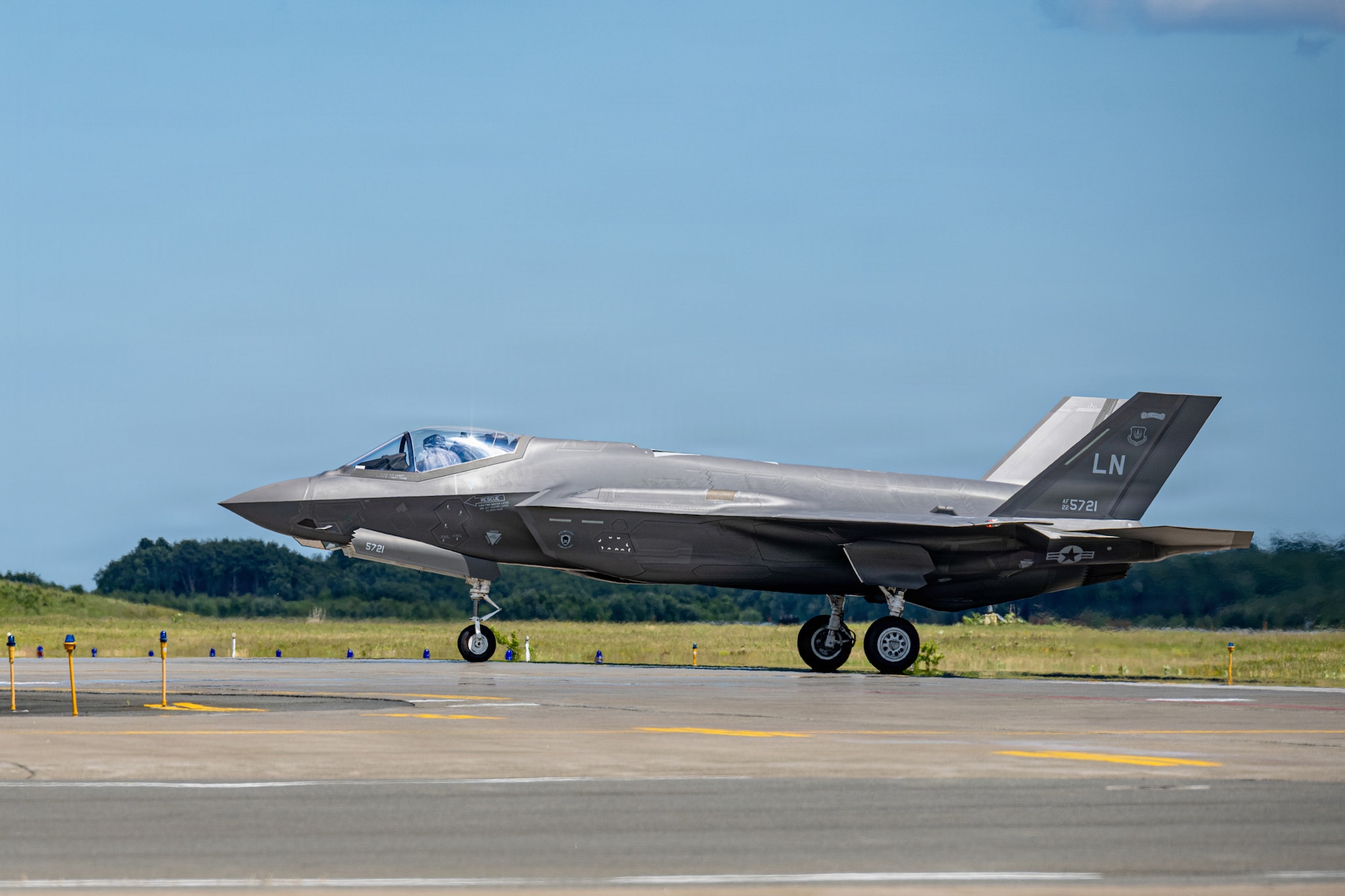 A U.S. Air Force F-35A Lightning II assigned to the 13th Fighter Squadron taxis off of the runway.