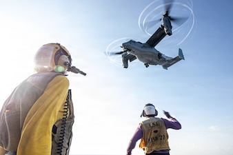 U.S. Sailors assigned to San Antonio-class amphibious transport dock ship USS Portland (LPD 27), observe an MV-22B Osprey with Marine Medium Tiltrotor Squadron (VMM) 163 (Reinforced), 11th Marine Expeditionary Unit, take off from the flight deck in the South China Sea, June 6, 2026.